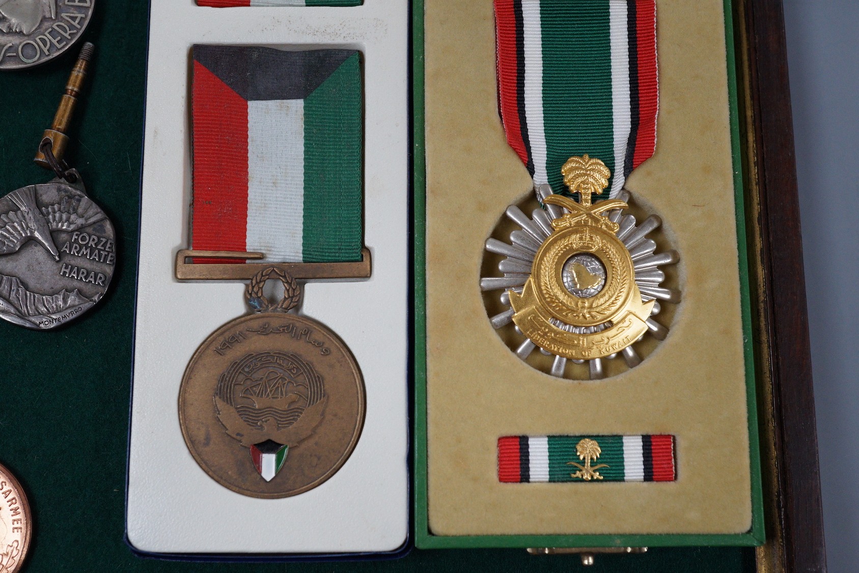 Foreign medals - Pakistan GSM with Kashmir 1948 clasp, two Liberation of Kuwait medals, Saudi Arabia and Kuwait issues, East German reserve medal, Italian Ethiopia Campaign 1937 medal, ONB badge and Combattimento medal,